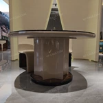 Faceted Pedestal Dining Table with High-Gloss Amber Burl Wood Top